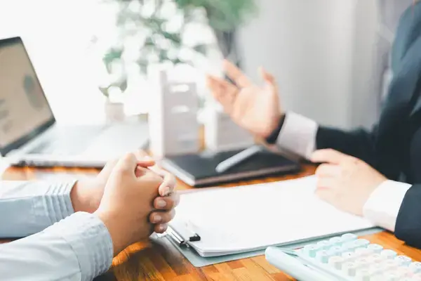 depositphotos_816704936-stock-photo-home-loan-officer-uses-calculator